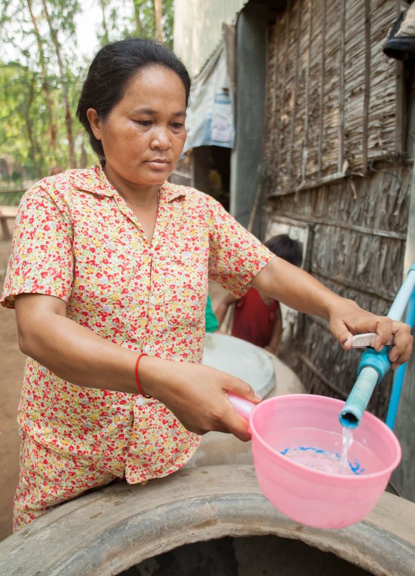 Habitante bénéficiant d'un service d'eau